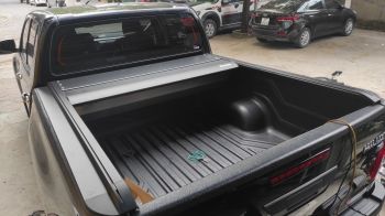 Nắp thùng cuộn điện toyota hilux